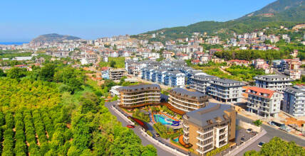 Apartment in a complex with rich infrastructure overlooking the forest in the center of Alanya
