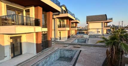 Villas in a complex close to the sea